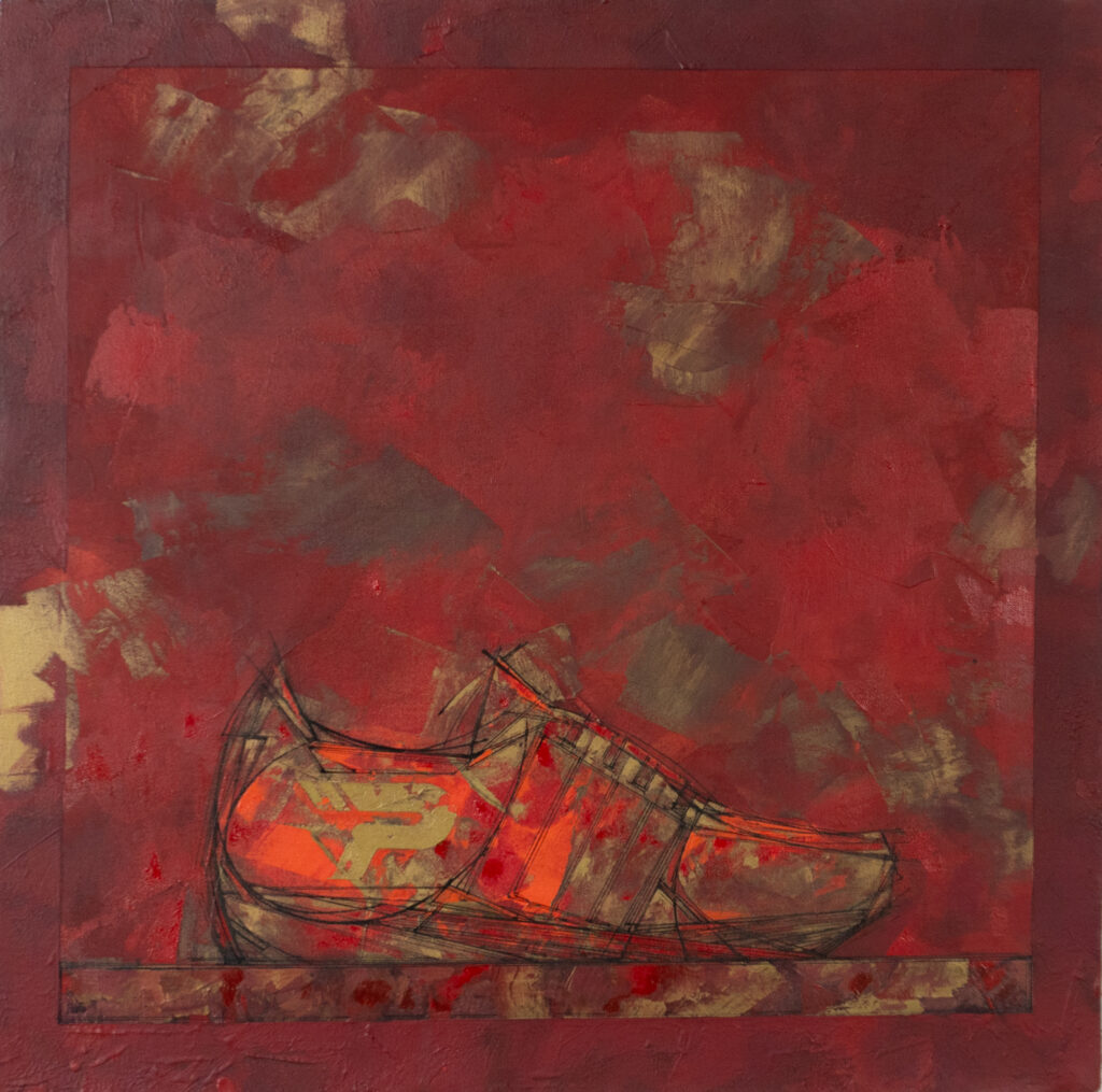 Sneaker sur fond rouge